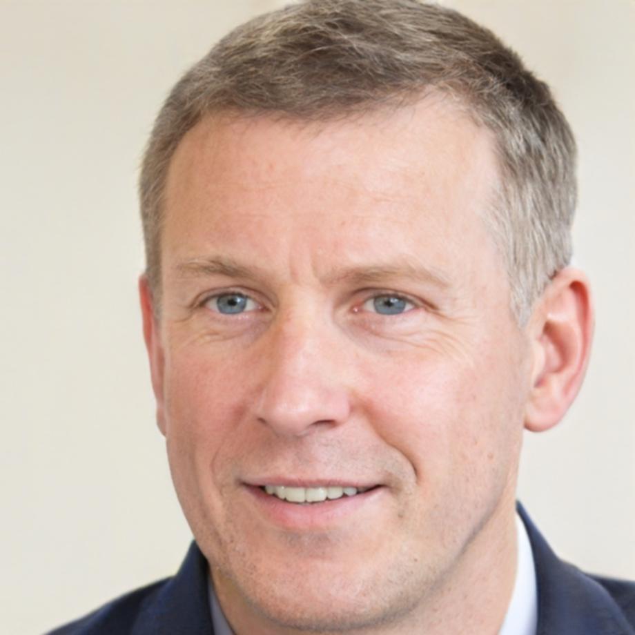 Julien Beaumont in kitchen preparing dough