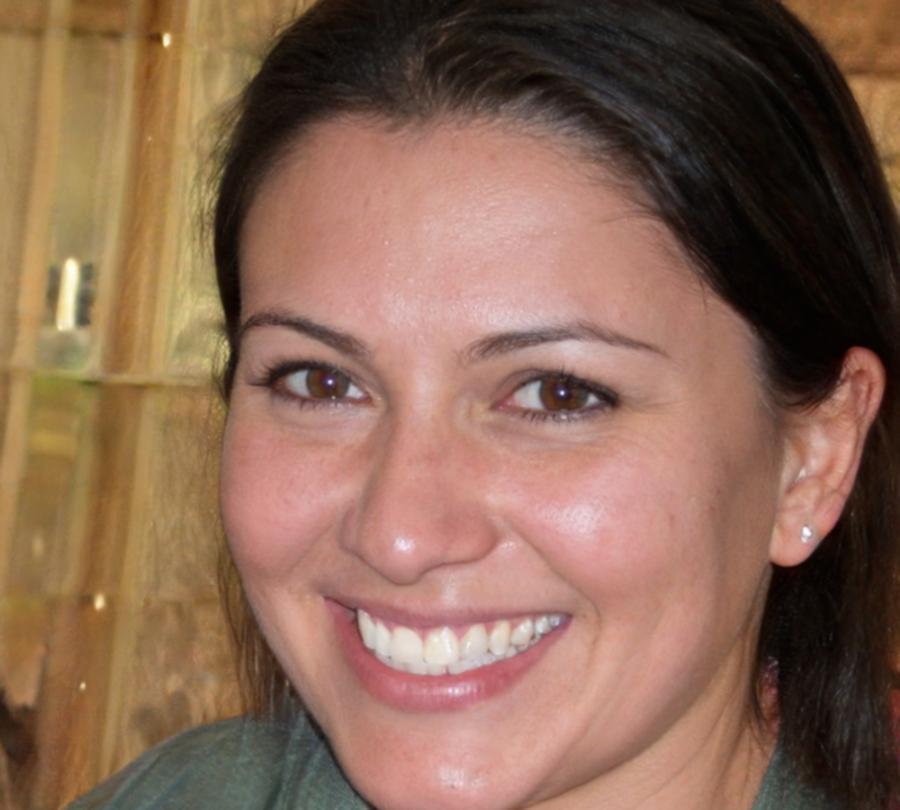 Rhiannon Delaney demonstrating pizza techniques